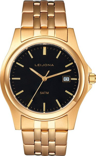 Guldpläterad Leijona Legends 74 Steel Gold unisexklocka fotograferad rakt framifrån. Klockan har en 38 mm boett, flerradigt stålarmband och en stilren svart urtavla med guldvisare samt datumvisning.