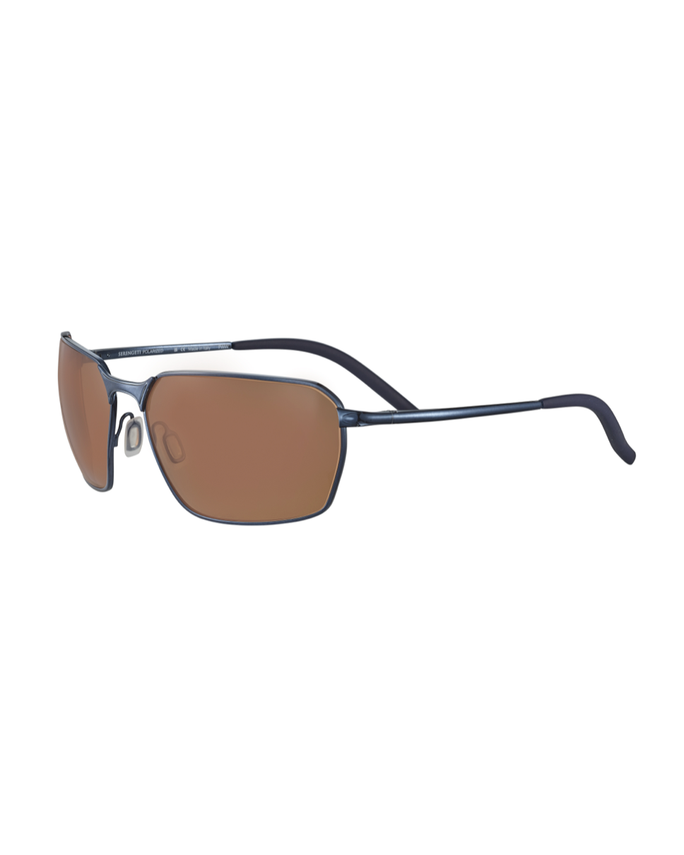 Serengeti Shelton SS547002 Shiny Navy Blue -aurinkolasit kuvattuna viistosti etuvasemmalta, tuoden esiin kehyksen ja linssin kaarevuuden.