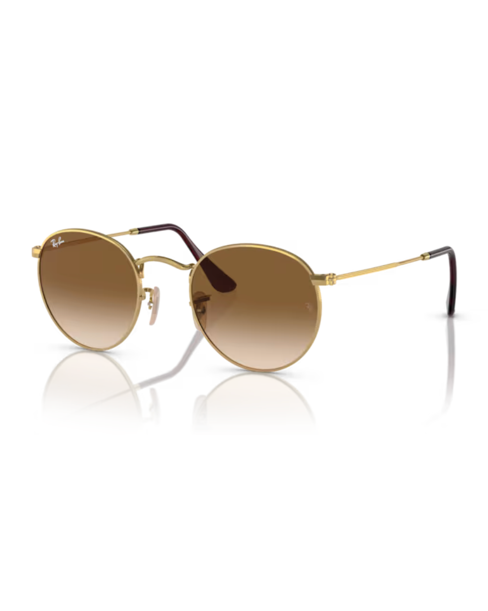Ray-Ban Round Metal RB3447 aurinkolasit kiiltävällä kullanvärisellä metallirungolla ja ruskeilla liukuvärjätyillä mineraalilasilinsseillä.