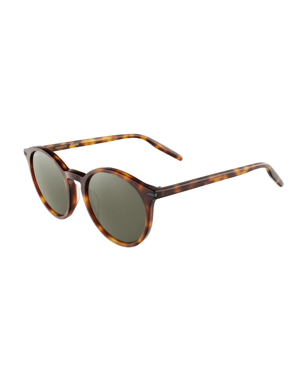 Serengeti Leonora Classic Tortoise -aurinkolasit kuvattuna viistosti etuvasemmalta, tuoden esiin asetaatin klassisen kuvioinnin ja vihreän linssisävyn.