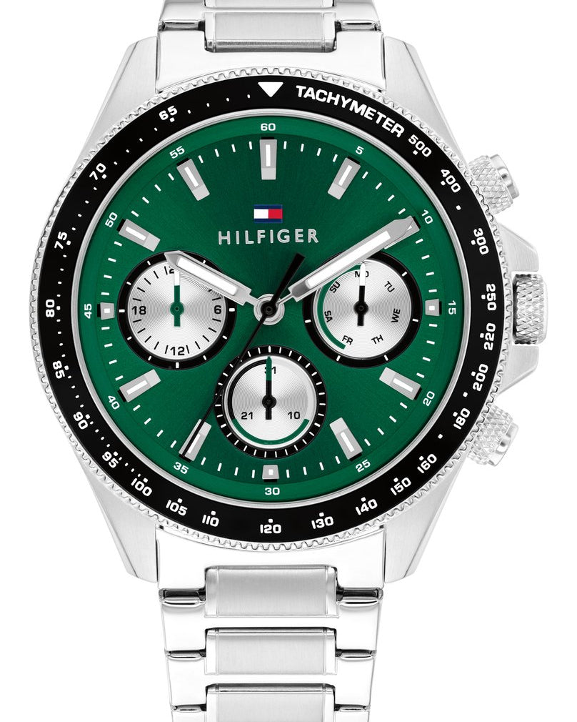 Tommy Hilfiger TH1792211 herrklocka med grön urtavla, svart tachymeter-bezel och silverfärgat stålarmband.