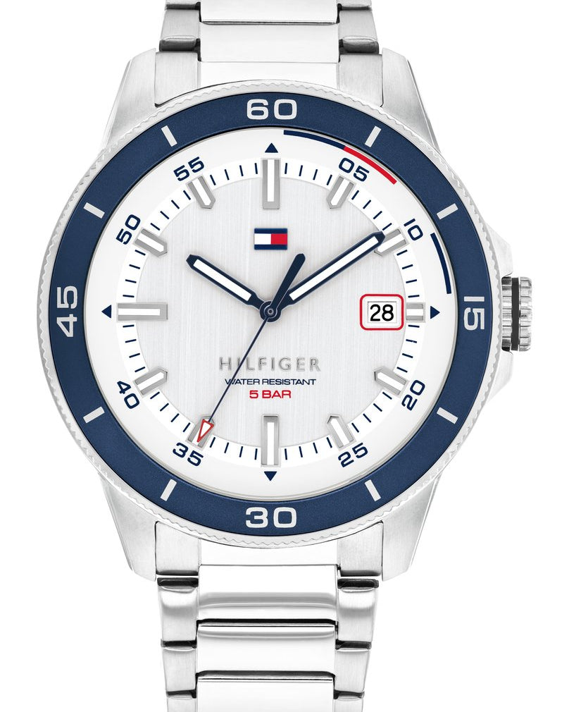 Tommy Hilfiger TH1792227 herrklocka med gräddvit urtavla, mörkblå bezel och silverfärgat stålarmband.
