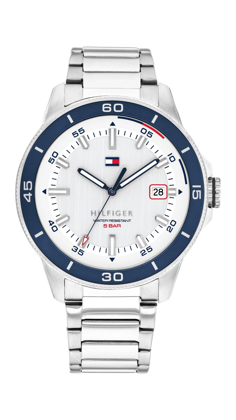 Tommy Hilfiger TH1792227 herrklocka med gräddvit urtavla, mörkblå bezel och silverfärgat stålarmband.