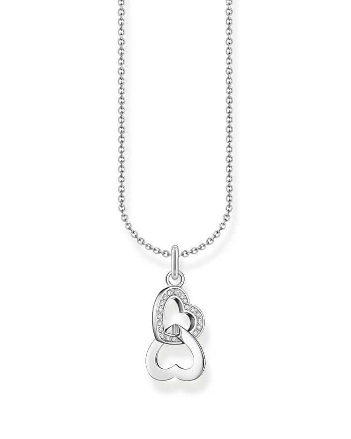 Thomas Sabo Necklace With Intertwined Pendant and Zirconia KE2267-051-14-L45V halsband med tunn silverkedja och två sammanflätade silverhjärtan. Ett av hjärtana är dekorerat med zirkoner.
Thomas Sabo Necklace With Intertwined Pendant and Zirconia KE2267-414-14-L45V halsband med tunn förgylld silverkedja och två sammanflätade förgyllda hjärtan