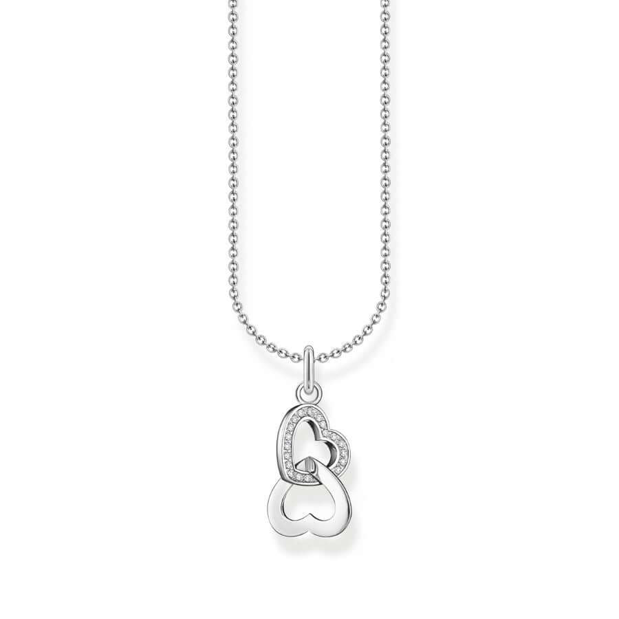 Thomas Sabo Necklace With Intertwined Pendant and Zirconia KE2267-051-14-L45V halsband med tunn silverkedja och två sammanflätade silverhjärtan. Ett av hjärtana är dekorerat med zirkoner.
Thomas Sabo Necklace With Intertwined Pendant and Zirconia KE2267-414-14-L45V halsband med tunn förgylld silverkedja och två sammanflätade förgyllda hjärtan