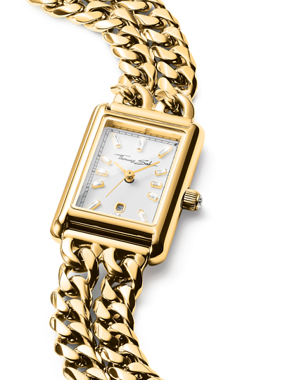 Lähikuva Thomas Sabo WA0429 -kellon suorakulmaisesta taulusta, jossa näkyvät kauniisti valkoinen aurinkohionta, laadukkaat baguette- ja princess-hiotut zirkoniaindeksit sekä kello kuuden päivämääränäyttö.