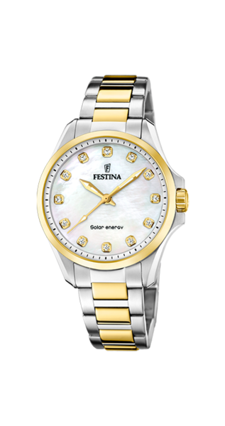 Festina Petite Cream Solar F20655/1 damklocka har en rund urtavla i pärlemor med guldfärgade index och visare. Ramen är guldfärgad. Boetten och remmen är silverfärgade med guldfärgade detaljer.