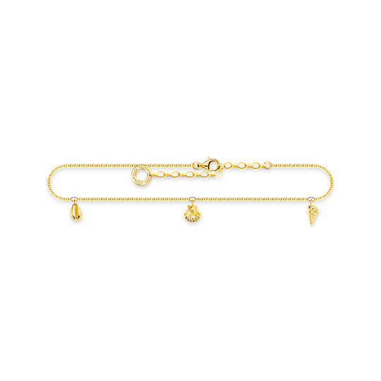 Thomas Sabo Anklet Shells Gold AK0037-413-39 ankelkedja.
Möt mig vid havet: Den filigranliknande venetianska fotlänken är tillverkad av högkvalitativt 925 sterlingsilver och förfinad med en strålande 18k gult guldplätering. Blickfångarna är tre olika snäckskalhängen. De är rikt detaljerade med fina, filigranlinjer.
Fotlänken kan justeras individuellt från 22 upp till 27 cm i längd. Den är dekorerad med en CHARM CLUB-logotyp. Detta smycke är en utmärkt accessoar till sommarklänningar, shorts och kjolar.