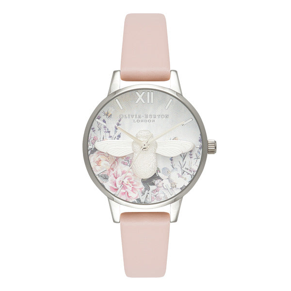 Olivia Burton Glasshouse Nude Peach & Silver OB16GH09 damklocka har en rund, silverfärgad och blommig urtavla prydd med ett stort silverfärgad bi i mitten. Indexen och visaren, liksom ramen och boetten, är också silverfärgade. Remmen är en hudfärgad läderrem utan sömmar.