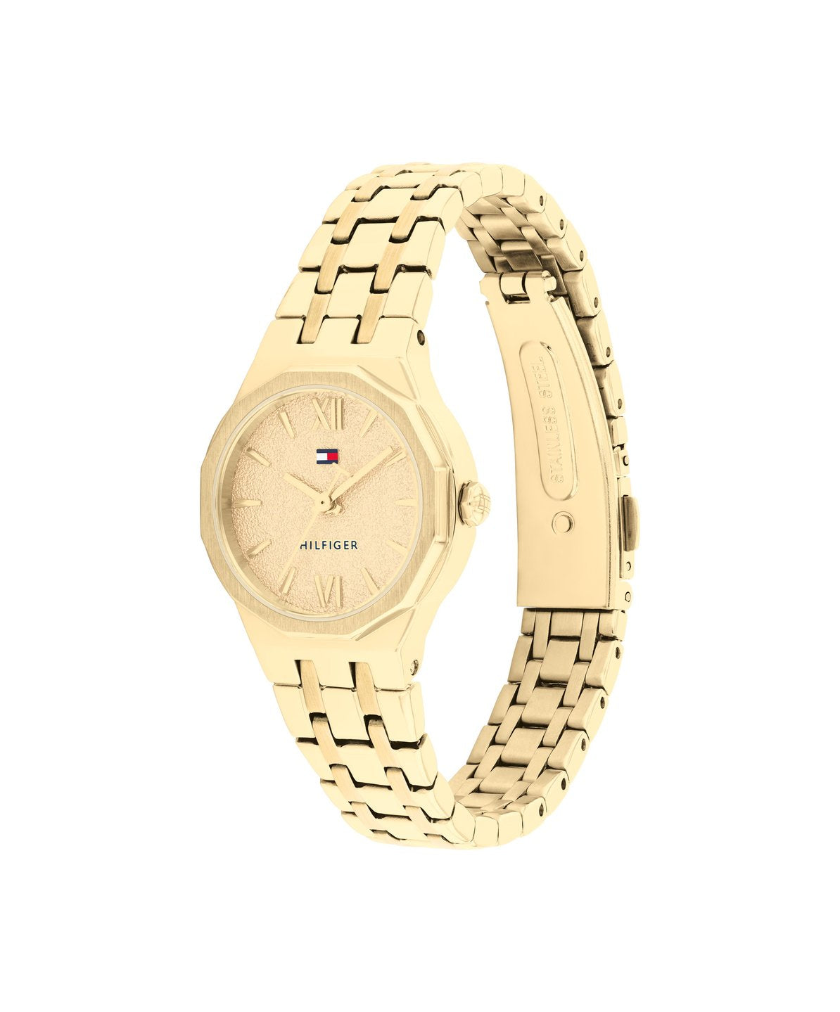 Guldfärgad Tommy Hilfiger TH1782886 damklocka fotograferad i vinkel från sidan, vilket framhäver boettens tjocklek på 8 mm och stållänkens eleganta former.