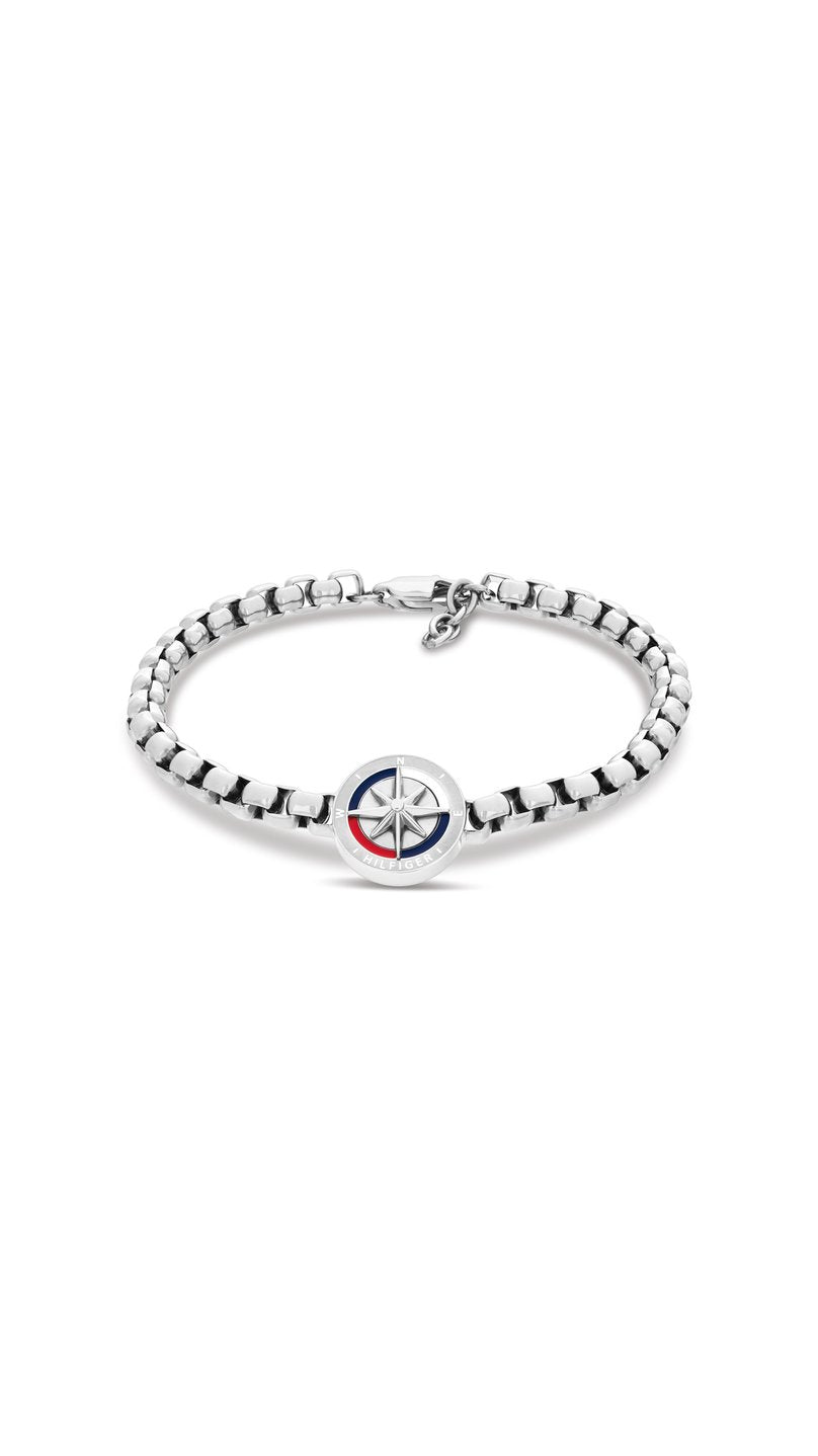 Hopeanvärinen miesten Tommy Hilfiger Compass thj2790726 -teräsrannekoru, jossa pyöreä kompassilaatta ja sinipunavalkoiset yksityiskohdat.