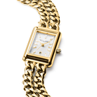 Lähikuva Thomas Sabo WA0429 -kellon suorakulmaisesta taulusta, jossa näkyvät kauniisti valkoinen aurinkohionta, laadukkaat baguette- ja princess-hiotut zirkoniaindeksit sekä kello kuuden päivämääränäyttö.