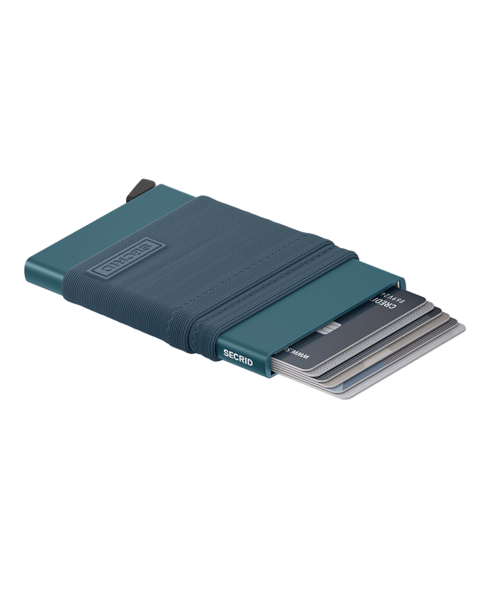 Secrid Flexwallet Teal -korttikotelon vivun mekanismi liu'uttaa kortit esiin.